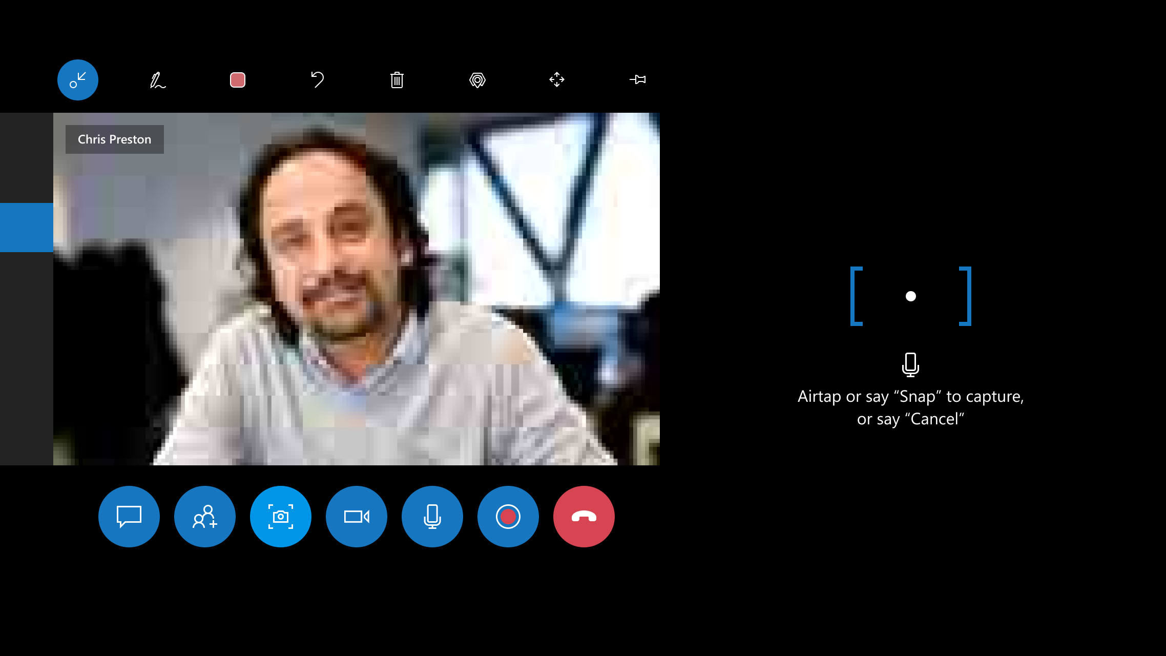 Tool Tip Screenshots of Dynamics 365 Remote Assist on HoloLens , showing the tooltip on HoloLens that prompts the technician to share a snapshot.