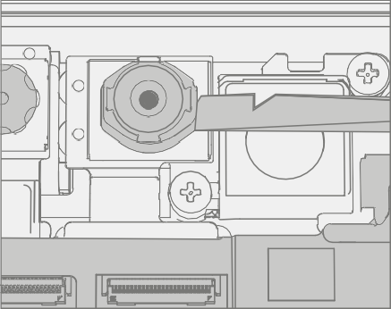 Diagram that shows front camera being lifted out of chassis with spudger.