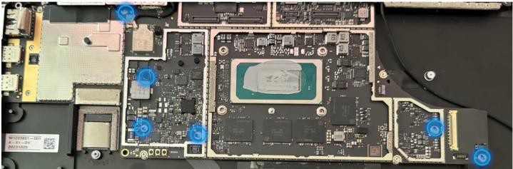 Screenshot that shows six 15-inch motherboard screws highlighted for removal.