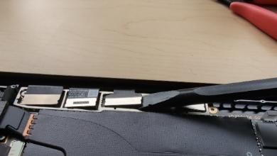 Screenshot that shows a close-up of the Display Assembly FPC connector being removed from the Surface Laptop