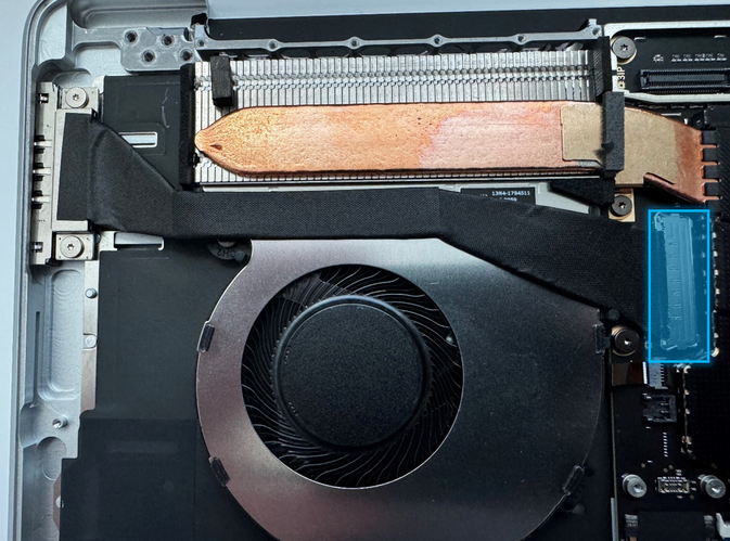 Screenshot that shows flipping up the latch and disconnecting the Surface Connect connector from the motherboard.