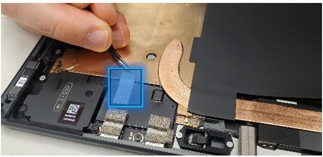 Screenshot that shows shielding tape placement beneath left speaker using silver cutout as alignment start.