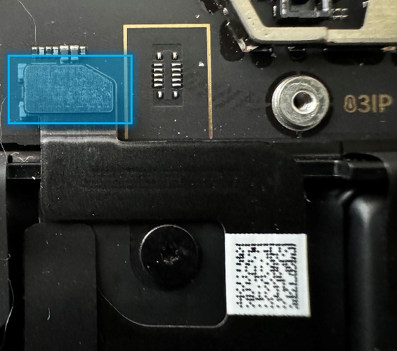 Screenshot that shows nylon spudger lifting battery FPC vertically from its motherboard connector.