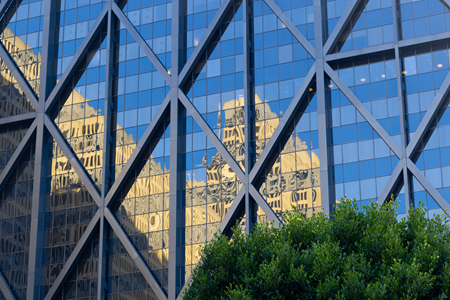 Screenshot of a skyscraper building in a city.