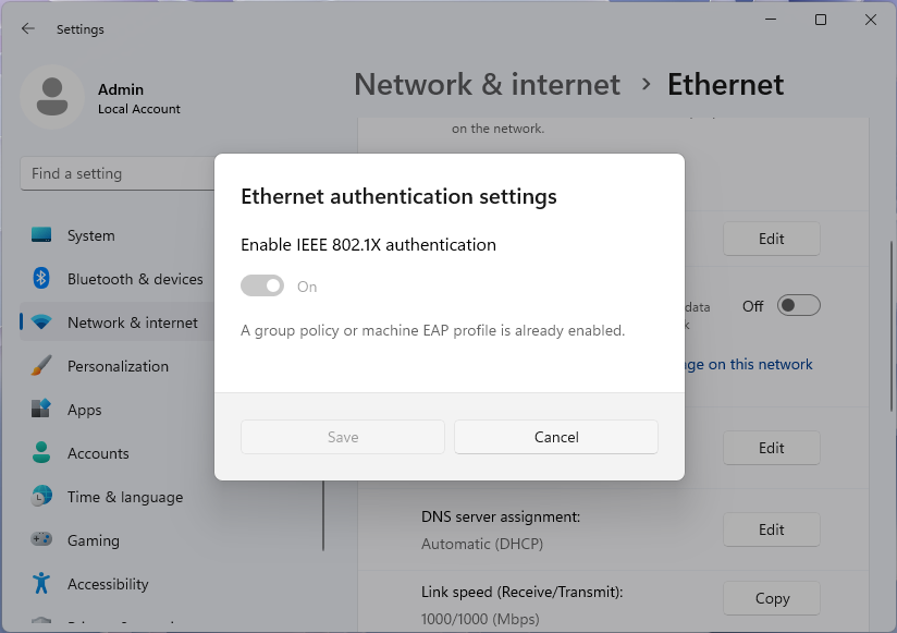 Screenshot of the Ethernet authentication settings dialog, disabled by Group Policy, in the Windows 11 Settings app.
