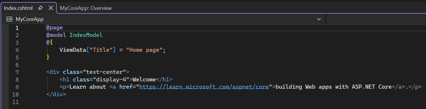 スクリーンショットは、Visual Studio Code エディターで開いている Index.cshtml ファイルを示しています。