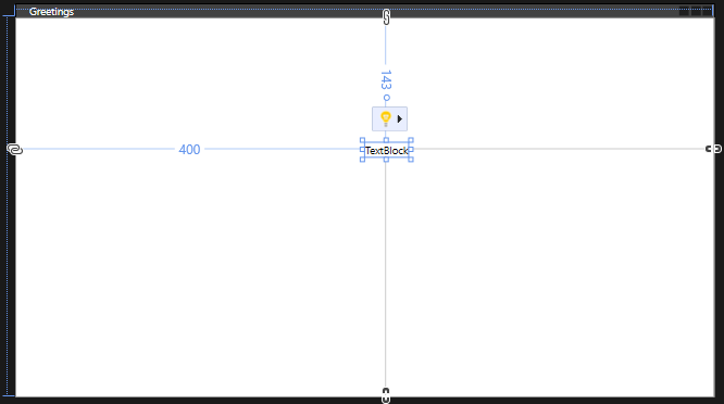 Captura de tela mostrando o controle TextBlock posicionado no formulário Saudações com as diretrizes visíveis.