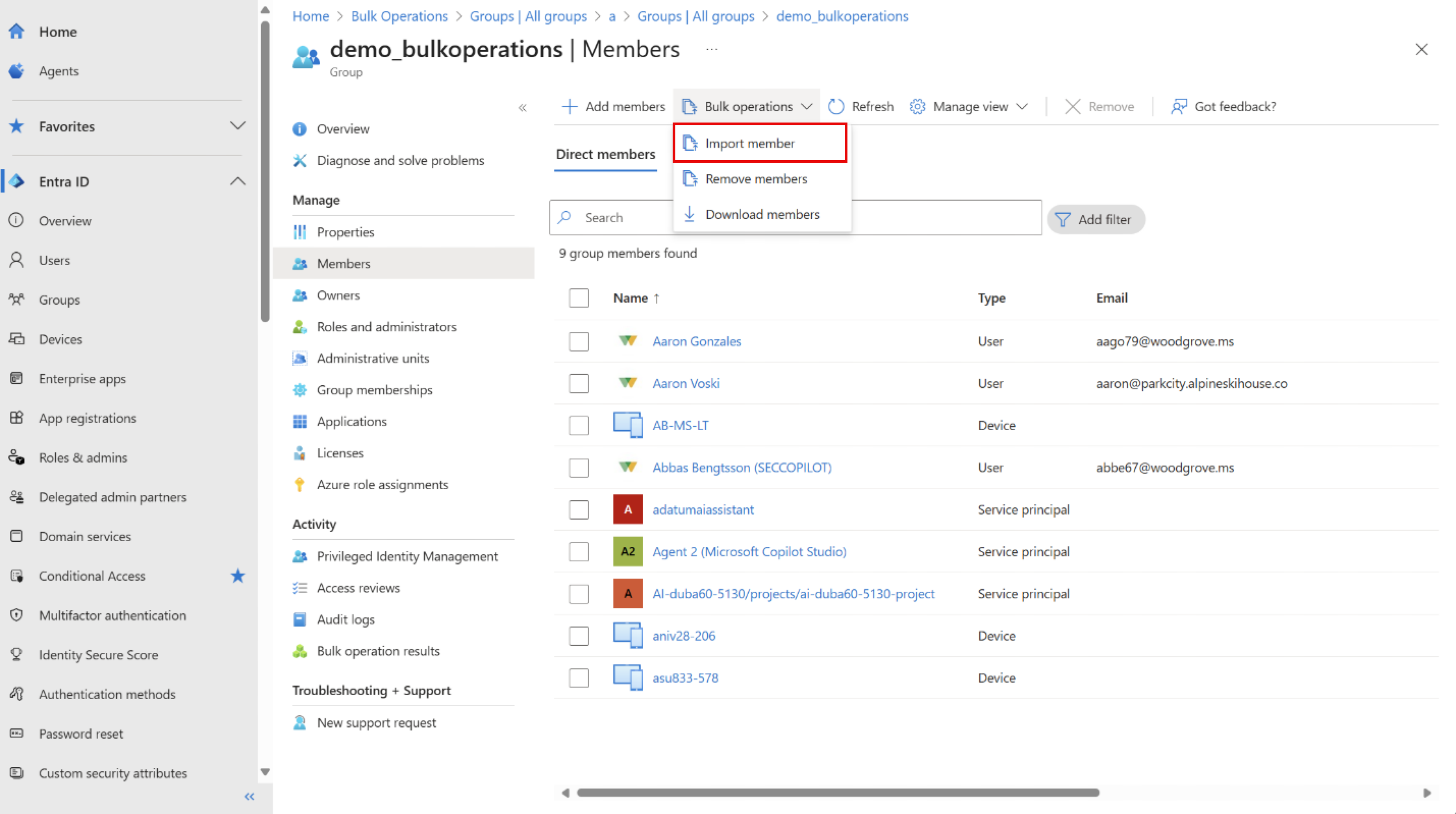 “成员”标签页上“批量操作”菜单的屏幕截图，其中选择了“导入成员”。