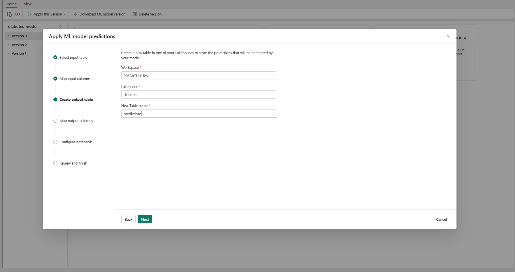 显示为 ML 模型预测创建输出表的步骤的屏幕截图。